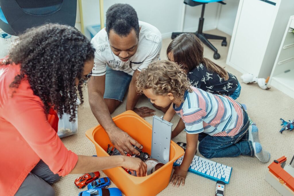 pexels-photo-7979756-4 A multicultural family enjoying playtime together with toys indoors, fostering love and joy.